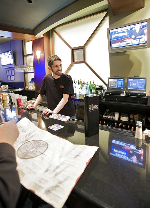 Jacob Baker, bartender at Hanley's Grill & Tap. See more photos from inside Hanley's in this slideshow. - PHOTO: JENNIFER SILVERBERG