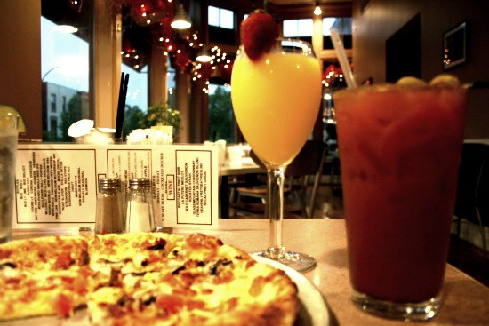 The classic breakfast pizza, mimosa and bloody mary -- three of Benton Park Cafe's house specialties - CHRISSY WILMES