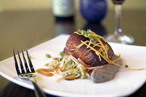 The classic Balaban's small plate of barbecue salmon is served with black bean hummus, warm slaw and tortilla strips. Here it is paired with a Willamette Valley Argyle Pinot Noir. View the full slideshow here. - PHOTO: JENNIFER SILVERBERG