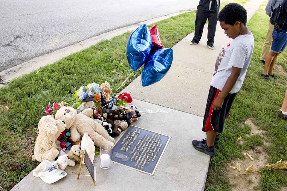 Visit Michael Brown's memorial to pay your respects to the slain teen who launched a national movement. - DANNY WICENTOWSKI