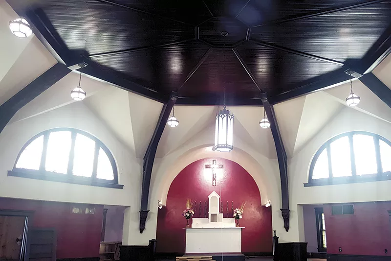 After John Brown sold the church earlier this month, the new owner set to work renovating the building. - PHOTO BY DANNY WICENTOWSKI