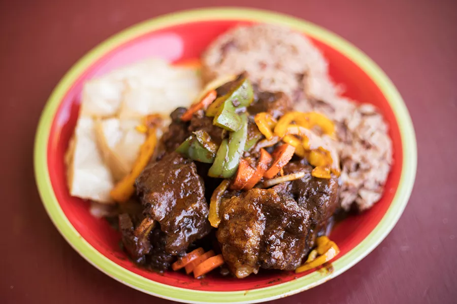 "Asher's Oxtail Entree” offers braised beef tails in a savory mixture of carrots, herbs and seasonings. - MABEL SUEN