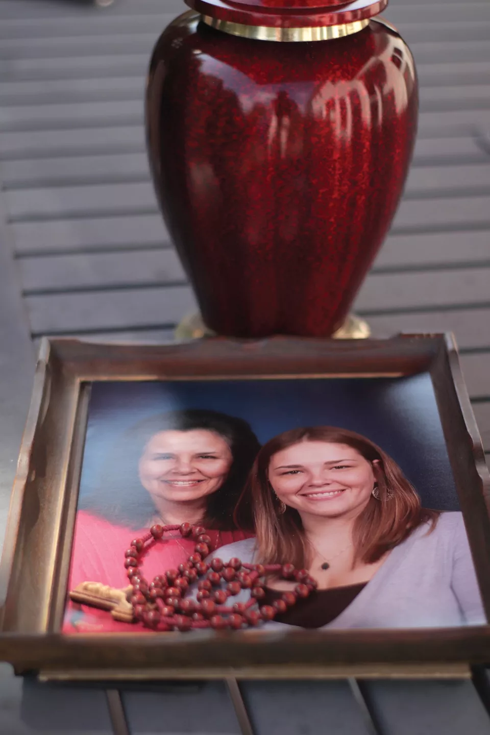 Angela Kender keeps her mother's ashes in an urn and hasn't been able to hold a memorial service yet because of the pandemic. - STEVEN DUONG