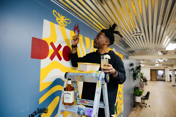 St. Louis Muralist Javyn Solomon @jayvnize / PHOTO CREDIT: Tristan Oliver @topshottah