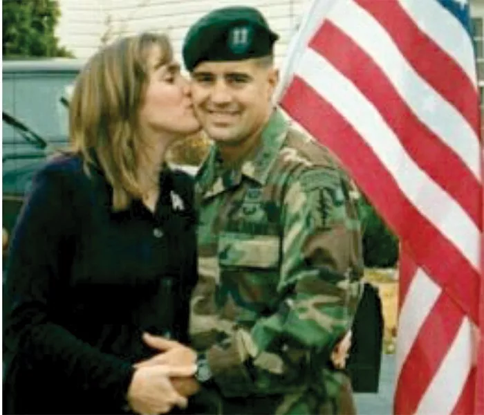 Dr. Osborn with her husband Jeffrey the day before he was deployed for Operation Enduring Freedom. - COURTESY DR. TIFFANY OSBORN