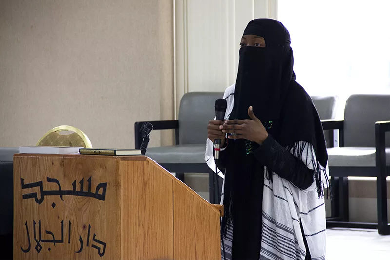 Sandi Bowers, a St. Louis elementary school teacher and member of CAIR-Missouri's team of "Muslim Speakers," addresses the visitors to the March 26 open house. - PHOTO BY DANNY WICENTOWSKI