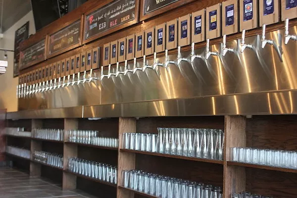 Tapped offers pour-your-own technology. - PHOTO BY SARAH FENSKE