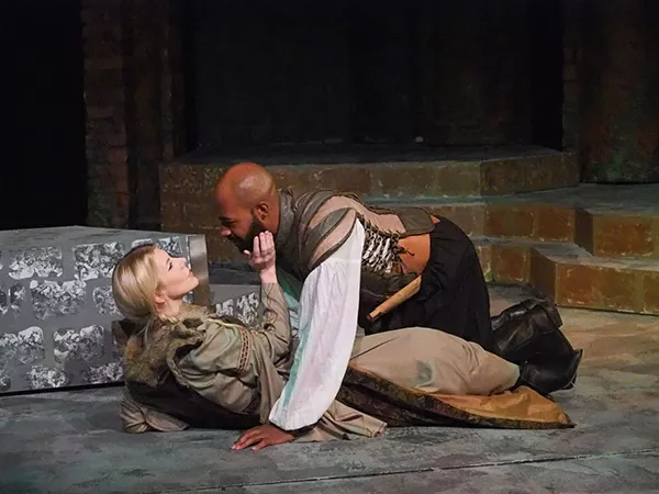 Queen Tamora (Suki Peters) romances her secret paramour, Aaron (Darrious Varner). - RON JAMES