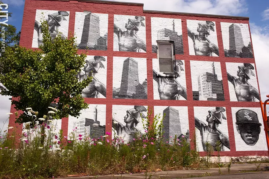 2013 mural "Commerce Moves Swifter Than Culture," by Gaia on the South Wedge Planning Committee building at 224 Mt. Hope Avenue. - FILE PHOTO