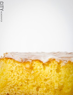 A slice of lemonade cake from Kneel & Neal Southern Cuisine. - PHOTO BY MARK CHAMBERLIN