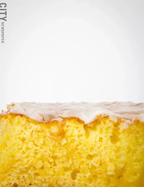 A slice of lemonade cake from Kneel & Neal Southern Cuisine. - PHOTO BY MARK CHAMBERLIN