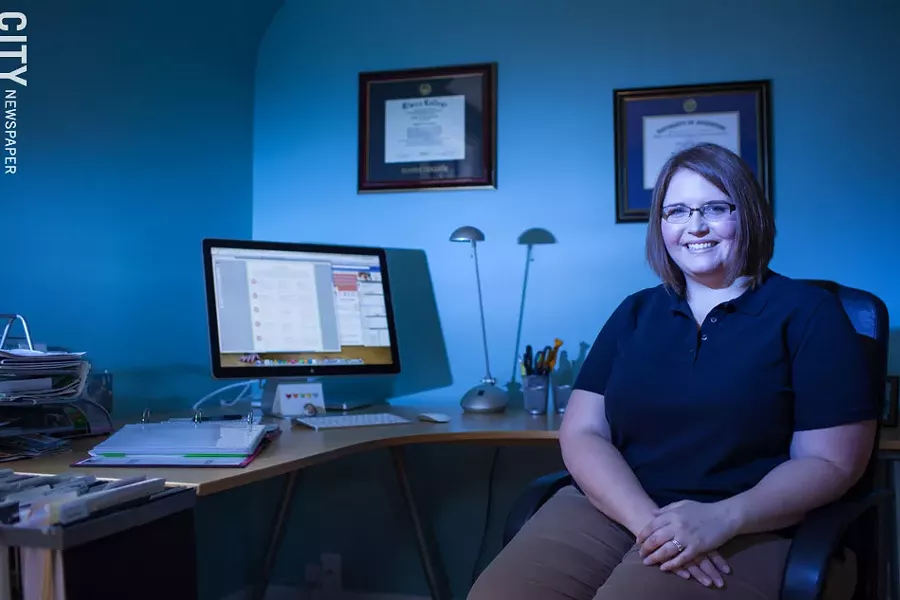 Brighton resident Monica Infante works from her home and needs a reliable, robust internet connection. - PHOTO BY MATT BURKHARTT