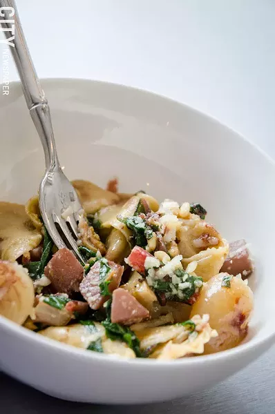 Butternut-squash-duck-confit tortellini, swiss chard, turnips, braised onions, and pine nut brown butter from Aunt Rosie's. - PHOTO BY MARK CHAMBERLIN