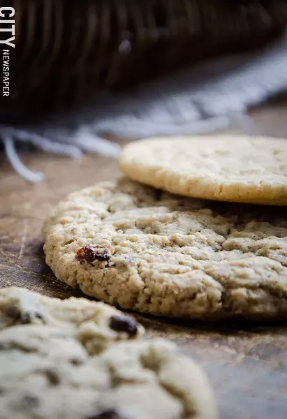 Chocolate chip, oatmeal raisin, and peanut butter cookies from Ellie's. - PHOTO BY MARK CHAMBERLIN