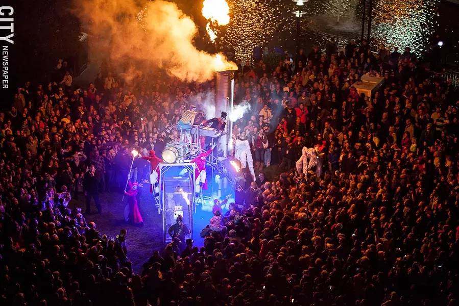 Circus Orange performed "Tricycle" in MLK Jr. Park at Manhattan Square. - PHOTO BY JOHN SCHLIA