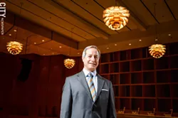 Eastman School of Music Dean Jamal Rossi in the Hatch Recital Hall. - PHOTO BY MARK CHAMBERLIN