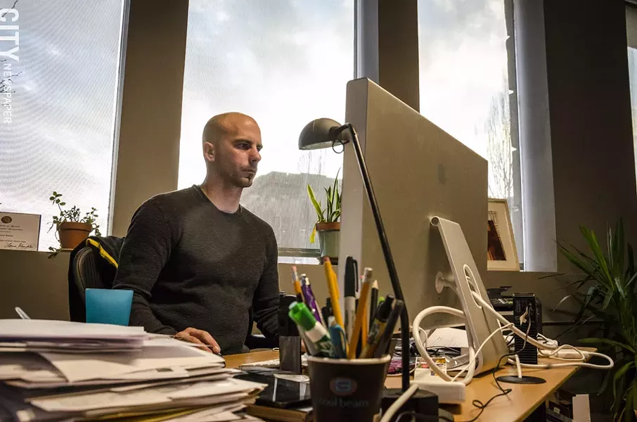 Jason Arena started Workinman in 2006 and now employs 42 people — from designers to developers. - PHOTO BY MARK CHAMBERLIN