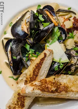 Mussels with green apple and apple cider cream sauce from Fraiche Bistro. - PHOTO BY MARK CHAMBERLIN