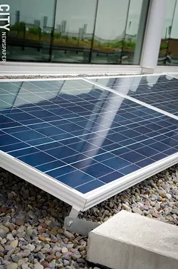 RIT's Golisano Institute for Sustainability has a 400 kilowatt solar array on its roof. - PHOTO BY MARK CHAMBERLIN