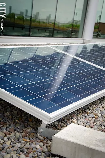RIT's Golisano Institute for Sustainability has a 400 kilowatt solar array on its roof. - PHOTO BY MARK CHAMBERLIN