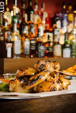 Taproom wings served with blue cheese, carrots, and celery from Rochester Taproom. - PHOTO BY MARK CHAMBERLIN