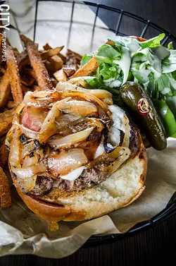 The Angry Goat Burger with caramalized onions, goat cheese, pancetta, - arugula, and balsamic mayo. - PHOTO BY MARK CHAMBERLIN