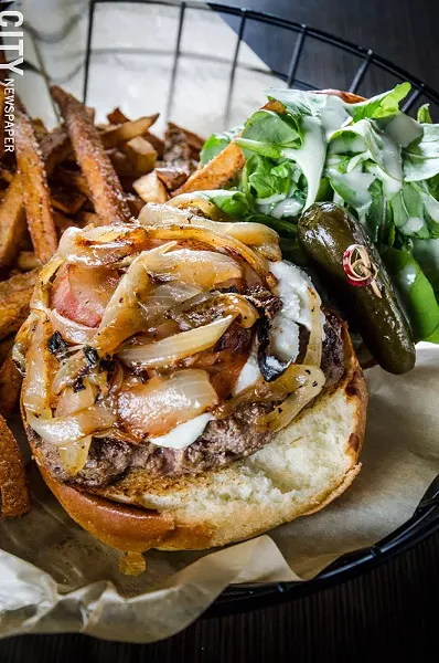 The Angry Goat Burger with caramalized onions, goat cheese, pancetta, - arugula, and balsamic mayo. - PHOTO BY MARK CHAMBERLIN