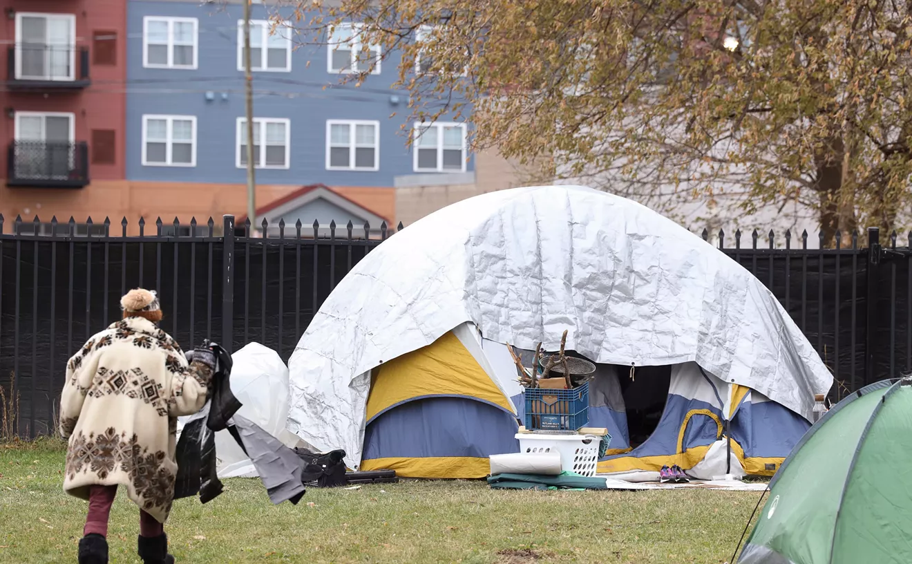 City moves to clear homeless camp as fencing is built