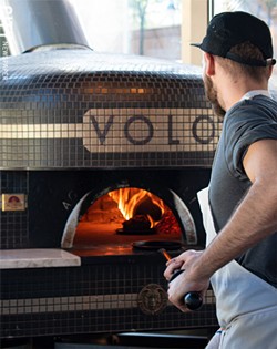 VOLO's brick, wood-fired Acunto Napoli oven is capable of flash-baking a pizza in just 60 seconds. - PHOTO BY JACOB WALSH