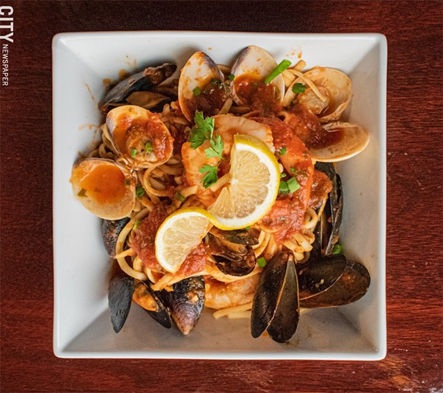 Pasta and seafood tossed in a spicy-hot diavolo sauce. - PHOTO BY JACOB WALSH