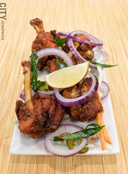 The hilariously titled "chicken lollipops" are just chicken wings marinated with spices, battered, and deep fried. - PHOTO BY JACOB WALSH