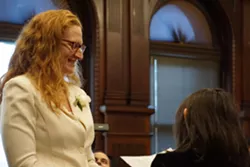 City Council member Mary Lupien is sworn in by her daughter, Maya, on January 2, 2020. - PHOTO BY GINO FANELLI