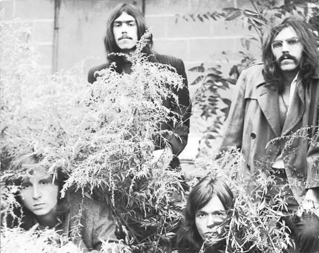 The early-70s Rochester blues rock band Rain (left to right): bassist Ted Paris, drummer MIck Guerin, singer Brad Morse, and guitarist Helmut Getto. - PHOTO BY JOE PELLINGRA