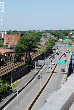 The Inner Loop looking east from Plymouth Avenue: The highway gives motorists a quick route across the northern portion of downtown Rochester, but it creates a barrier between downtown and neighborhoods to the north. - PHOTO BY RYAN WILLIAMSON