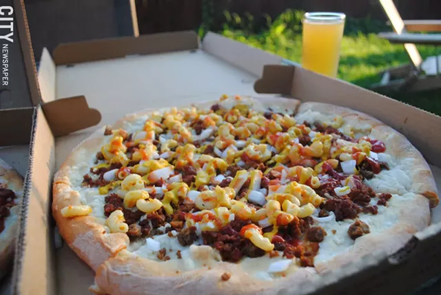 Vegan pizza and other meals are available for pick-up from New Ethic Vegan Pizza. - PHOTO BY RENÉE HEININGER
