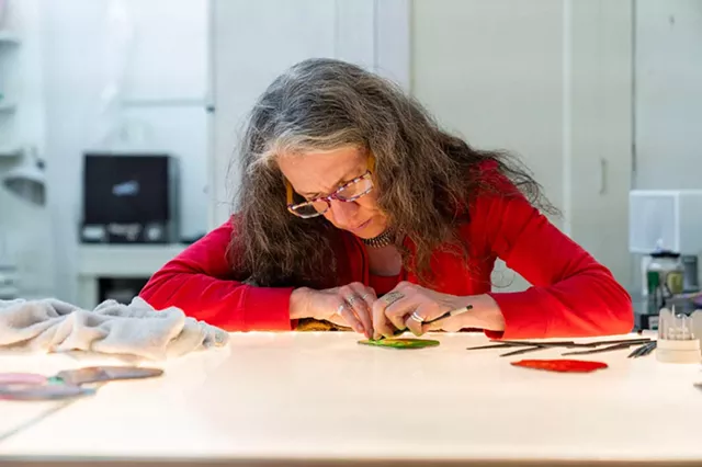 Stained-glass artist Judith Schaechter at work. - PHOTO PROVIDED