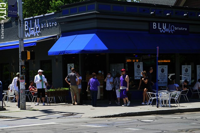 The scene outside Blu Wolf Bistro on June 4, 2020, the first day outdoor restaurant seating was re-introduced. - PHOTO BY GINO FANELLI