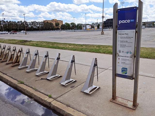 An empty Pace bike share rack remains near Monroe Community College's downtown campus on State Street. - PHOTO BY JEREMY MOULE