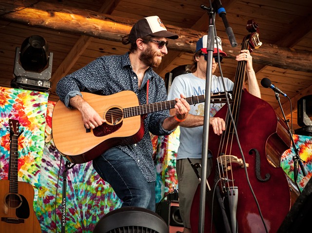 Max Flansburg (left) performing with Dirty Blanket at Lincoln Hill Farms on July 3. - PHOTO BY TOM FUCILLO