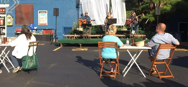 The Spring Chickens perform a physically distant show outside of The Little Theatre. - PHOTO BY JEFF SPEVAK