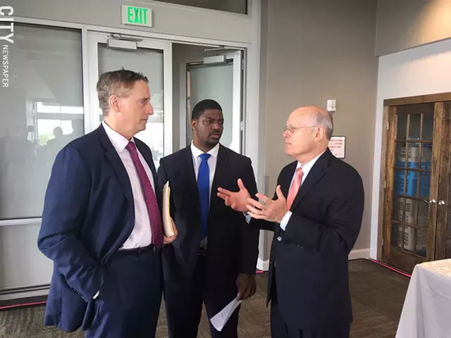 Greater Rochester Chamber of Commerce CEO Bob Duffy, left, and Adrian Hale, the Chamber's workforce and economic development manager, talk with charter school advocate David Osborne during a conference in 2019. - PHOTO BY TIM LOUIS MACALUSO