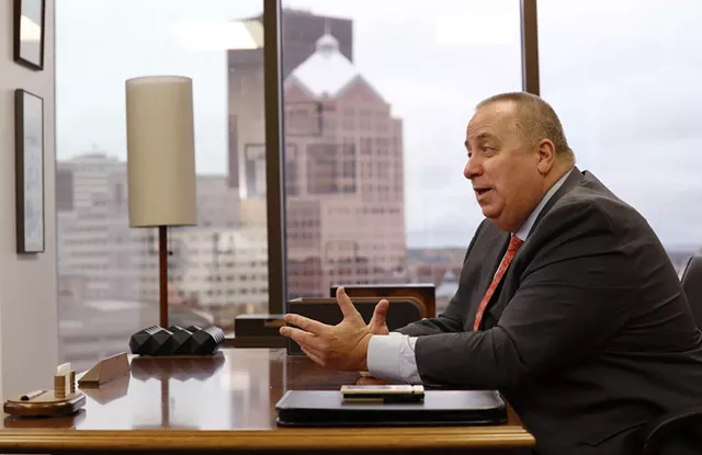 Defense attorney Joe Damelio in his office in the First Federal Building in downtown Rochester. - PHOTO BY MAX SCHULTE