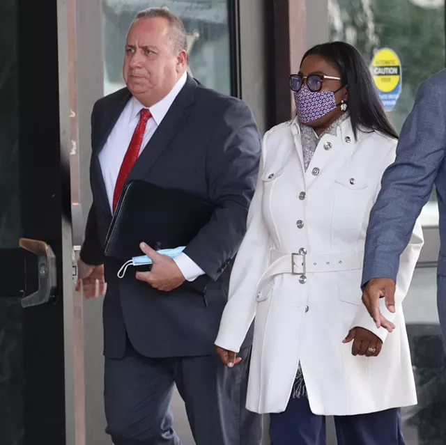 Defense attorney Joe Damelio accompanies his client, Mayor Lovely Warren, to court for her arraignment in October 2020. - PHOTO BY MAX SCHULTE