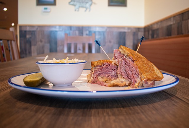 A reuben sandwich with a side of coleslaw. - PHOTO BY JACOB WALSH