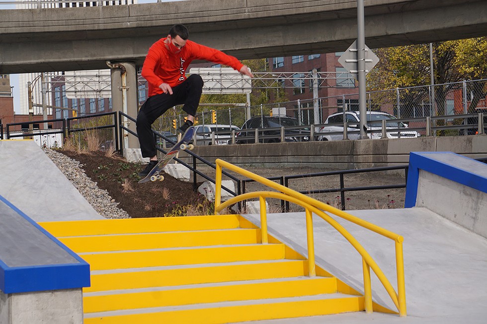Nick Donofrio frontside 180s a stair set at the Roc City Skatepark. - PHOTO BY GINO FANELLI