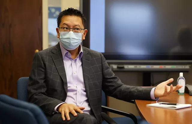 Monroe County Public Health Commissioner Dr. Michael Mendoza speaks from a conference room near his office at the county Health Department. - PHOTO BY MAX SCHULTE
