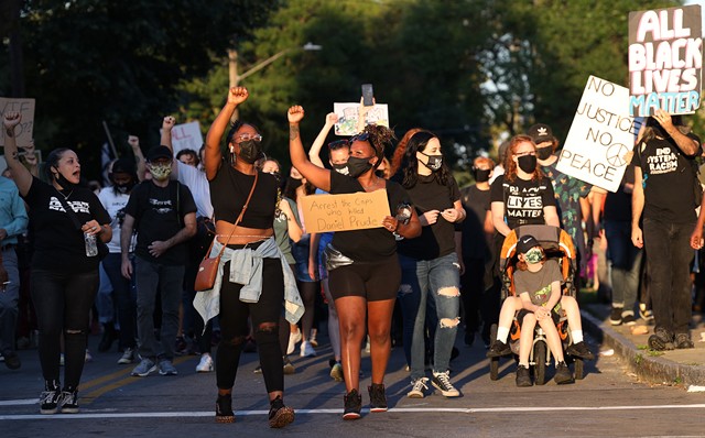 One of many Black Lives Matter marches that took place in the Rochester area during the course of the pandemic - PHOTO BY MAX SCHULTE