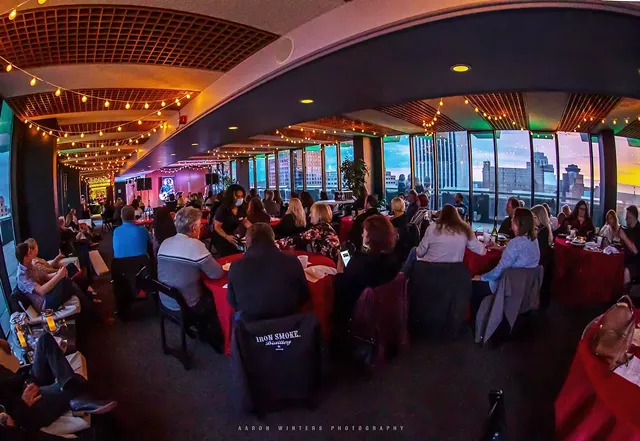 Tommy Brunett plays to an intimate crowd at The Penthouse at One East Avenue. - PHOTO BY AARON WINTERS
