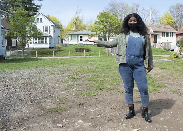 Marketview Heights resident Ashley Smith wants to convert a vacant lot on Mona Street into a community garden. - PHOTO BY JACOB WALSH