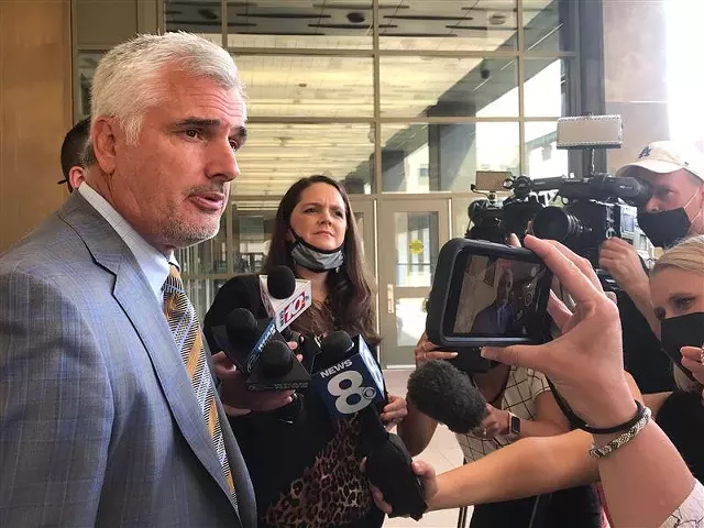 John DeMarco, the defense attorney for Timothy Granison, speaks to reporters outside Rochester City Court following Granison's arraignment on May 20, 2021. - PHOTO BY MAX SCHULTE